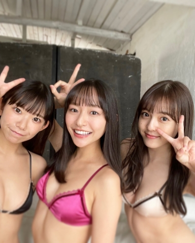 Three beautiul women as store managers in swimsuit bikinis012